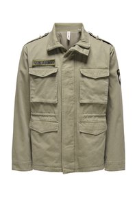 Giacca militare verde oliva in cotone, con spalline, quattro tasche frontali e una patch "U.S. ARMY" sul petto sinistro.