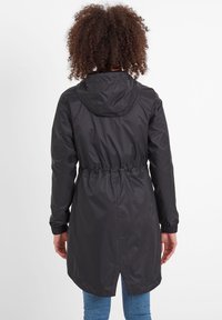 Black hooded jacket made of lightweight material, featuring an elastic waistband, long sleeves, and a split hem at the back.