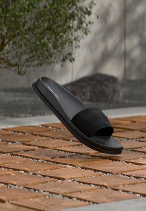 Calvin Klein CITY MULE - Papucsszandálok - triple black