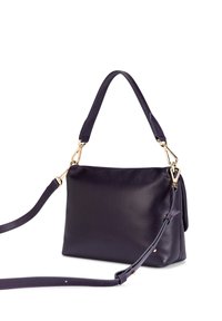 Purple leather handbag with a smooth texture, a structured shape, featuring gold hardware and a removable strap for versatile carrying.