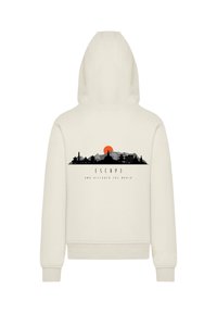 Cremefarbener Hoodie mit einem großen, grafischen Design auf dem Rücken, das eine Stadtsilhouette, Berge und eine Sonne zeigt. Mit einer verstellbaren Kapuze und gerippten Bündchen.