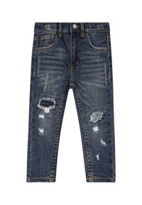 Dark blue denim jeans with distressed patches, five-pocket design, visible stitching in contrasting golden yellow, and slim fit.
