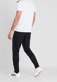 adidas Performance Pantalones deportivos - black