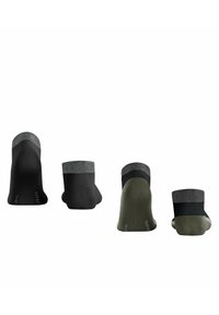 Vier Paar Knöchelsocken in unterschiedlichen Farben: Schwarz, Grau, Dunkelgrün. Die Materialien wirken weich mit kontrastierenden Texturen an der Oberseite und an den Sohlen.