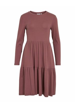 Long-sleeve, ribbed dress in dusty rose, features a fitted bodice with a flared, tiered skirt and a round neckline. Soft cotton texture.