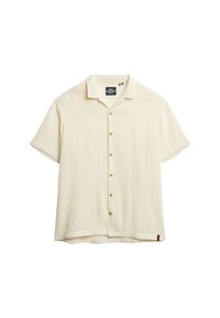 Kortærmet, cremefarvet skjorte med knapper i et tekstureret stof, som har en krave og fem brune knapper foran.