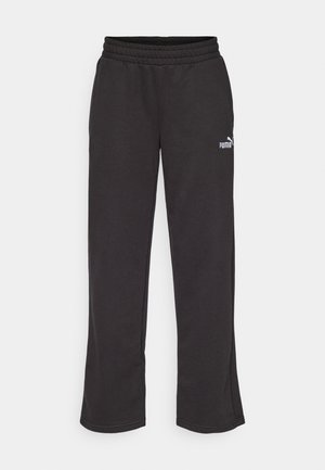 Sort sweatpants med en afslappet pasform, elastisk talje og lille hvid Puma-logo på venstre lår. Fremstillet af blødt, holdbart stof.
