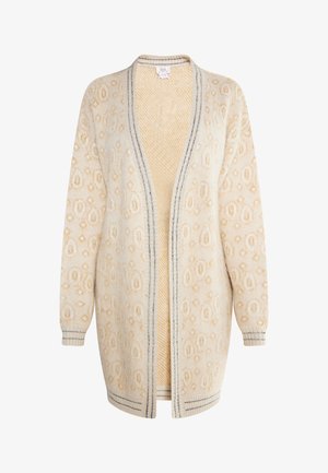 Světlý béžový cardigan s texturovaným diamantovým vzorem, otevřený vpředu a s dlouhými rukávy. Doplněn námořnickou modrou nití podél okrajů.