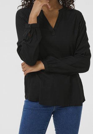 Bluse - mottled black