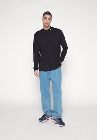 Nike Sportswear MOCK NECK - Bluză de molton - black