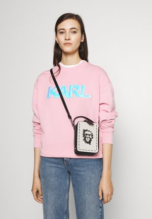 IKONIK GRAFFITI CROSSBODY - Across body bag - natural