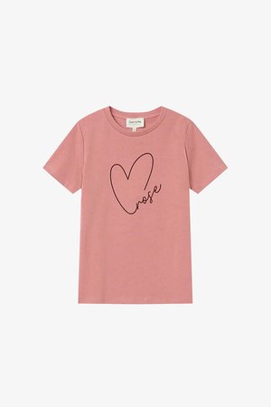 T-shirt en coton rose à manches courtes, avec un graphique en forme de cœur noir et le mot "rose" en écriture cursive. Coupe régulière, col rond.
