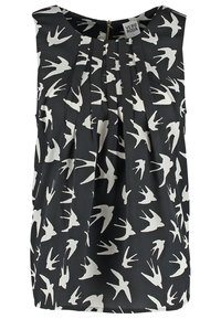 Blouse noire sans manches avec imprimé d'hirondelle blanche et plis devant, avec une étiquette de marque Vero Moda à l'intérieur du col.