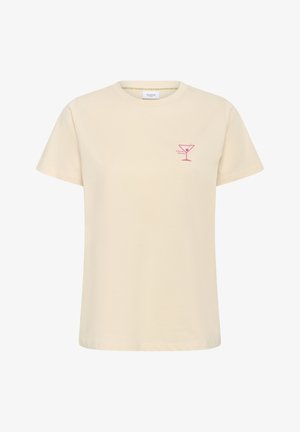 Svetlo béžové bavlnené tričko s grafickým vyobrazením ružového koktailového pohára na ľavej strane hrudníka a okrúhlym výstrihom s krátkymi rukávmi.