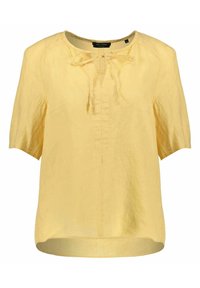 Gelbe Leinenbluse mit kurzen Ärmeln, V-Ausschnitt und Bindebanddetails an der Vorderseite. Bietet eine lässige Passform und einen leicht geschwungenen Saum.