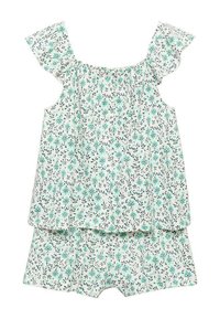 Top senza maniche con motivo floreale e maniche a frufru, in tonalità di verde chiaro e bianco. Include pantaloni corti abbinati.