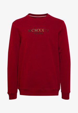 Rotes Sweatshirt mit Rundhalsausschnitt, langen Ärmeln und gerippten Bündchen. Auf der Vorderseite befindet sich gestickter Text "MCMXXIV FQ1924" in metallischen Farben.