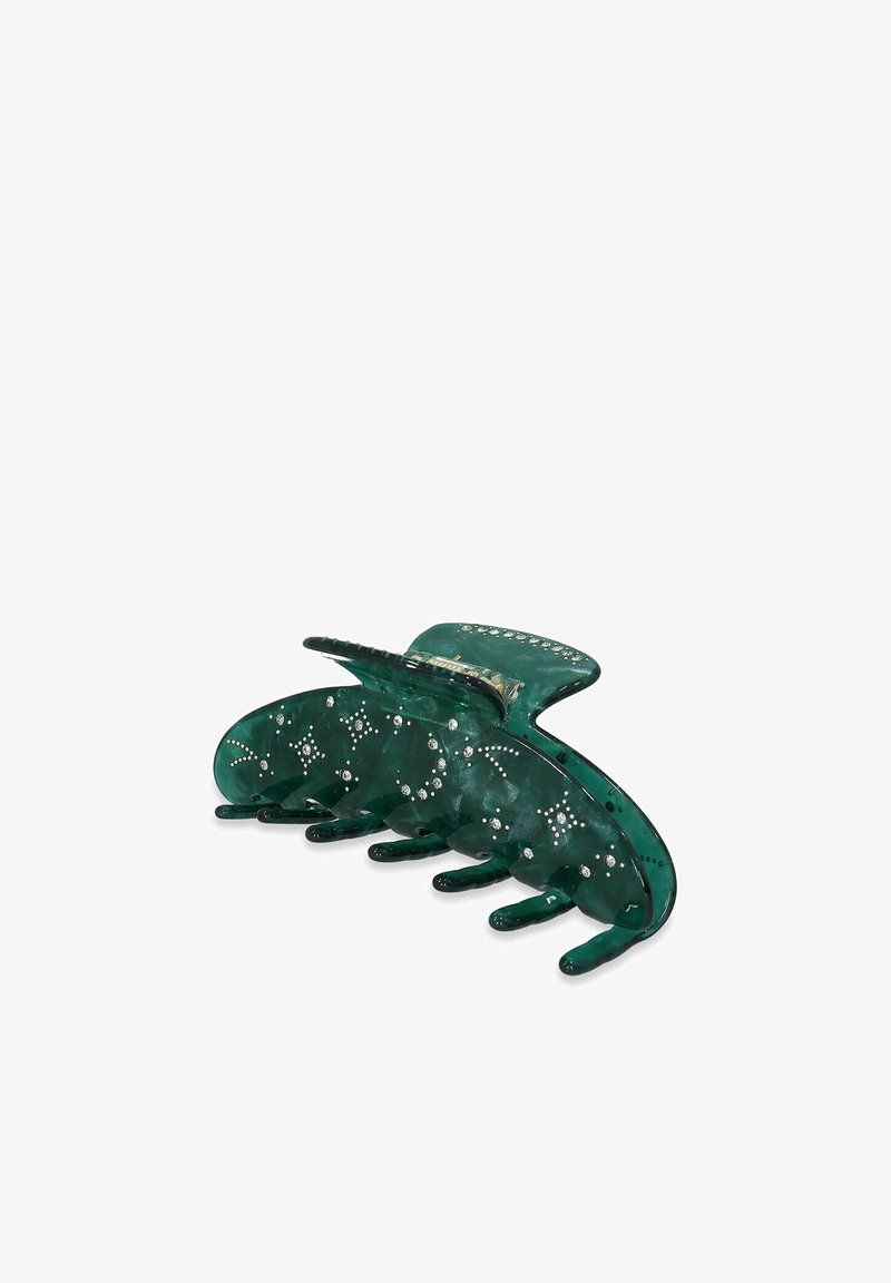Green translucent hair claw with a unique shape, featuring decorative silver accents and a sturdy grip for secure styling.