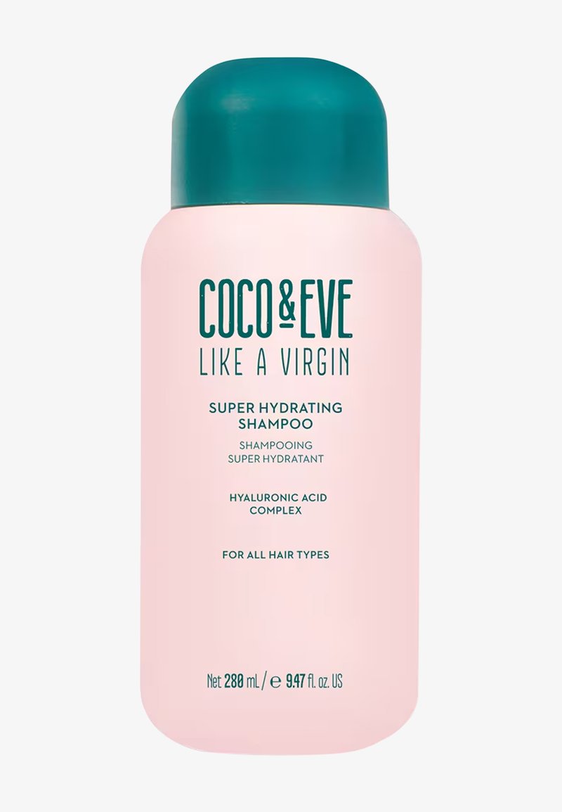 Rosa schampo-flaska med en turkos kork, märkt "Coco & Eve Like a Virgin Super Hydrating Shampoo", med detaljer om hyaluronsyrakomplex.