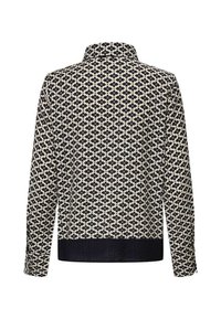 Chemise à manches longues dans un motif crème et marine, avec un col, un tissu texturé et un ourlet inférieur uni marine.