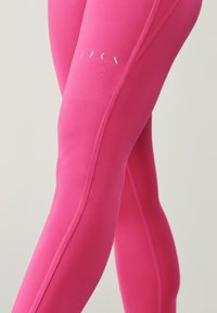 Born Living Yoga UMAY - Tights - rosa