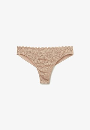 Daintymächtig in Nude-Farbe, mit kunstvollen Blumenmustern, wellenförmigen Kanten und einem glatten Futter für zusätzlichen Komfort.