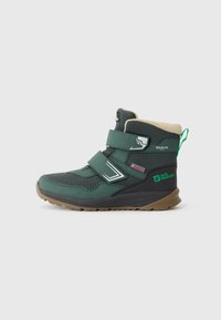 Green waterproof hiking boots with two Velcro straps, a textured upper, tan fleece lining, and a rubber outsole. Features branding on the side.