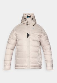 Jachetă izolată de culoare bej deschis, cu glugă, textură matlasată, șnur reglabil, buzunare cu fermoar și un accent triangular de culoare neagră.