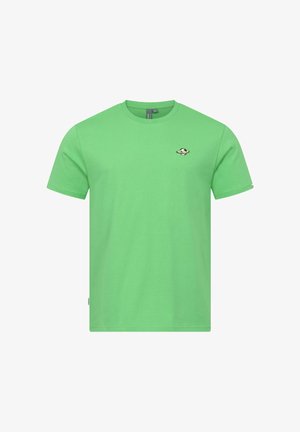 Maglietta verde a maniche corte con scollo rotondo, con una piccola toppa di un pianeta con anelli sul petto sinistro.