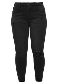 Vaqueros pitillo negros de cintura alta con detalles desgastados en los muslos y dobladillos deshilachados, confeccionados en tejido denim. Diseño clásico de 5 bolsillos.