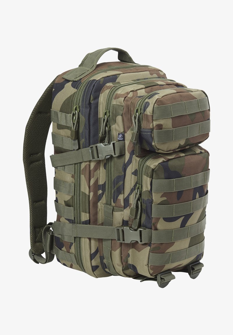 Kamo tipas kuprinė, turinti kelis užtrauktukais uždaromus skyrius, sustiprintas diržus ir šoninę tinklinę medžiagą įrangai pritvirtinti. Alyvmedžių žalia ir ruda spalvos.