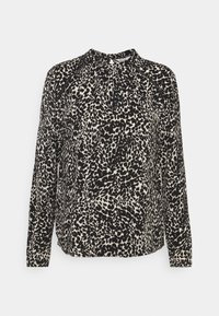 Blouse à manches longues en tissu beige avec un motif léopard noir. Présente un col montant et des détails froncés aux épaules.