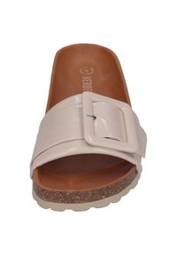 Beige slide sandal with a wide glossy strap featuring a square buckle. The insole is brown with a textured finish and a cork sole.