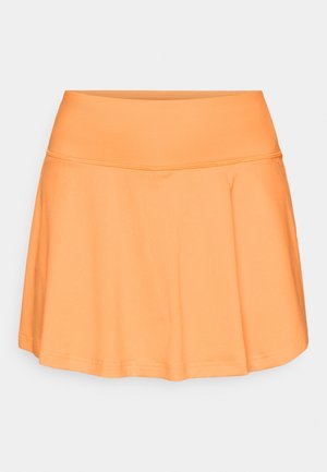 Falda deportiva naranja con una cintura ancha, hecha de tela de malla transpirable. El diseño presenta una forma acampanada y una textura suave.