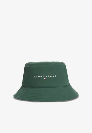 Green bucket hat made of fabric with a stitched brim. Features "TOMMYJEANS" logo in white and red accent below the text.