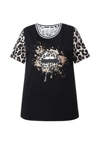 Camiseta negra con mangas cortas de estampado de leopardo, con un gráfico de labios dorados y de leopardo salpicado de pintura. Material de algodón suave.