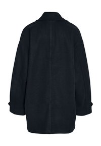 Übergroßer schwarzer Wollmantel mit Kragen, abgesenkten Schultern und gerader Silhouette. Mit einer mittigen Naht auf der Rückseite und seitlichen Taschen.