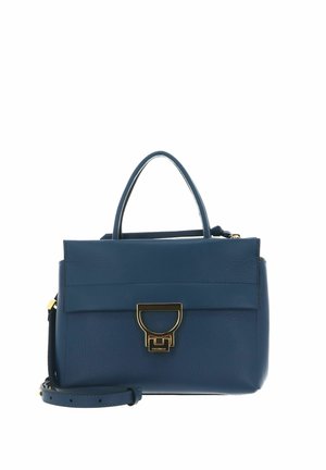 Sac à main en cuir bleu avec poignée supérieure, fermoir doré et bandoulière amovible sur fond blanc.