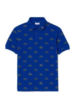 Niebieska koszulka polo wykonana z bawełny, z wzorem małych zielonych logo krokodyli, krótkimi rękawami i klasycznym kołnierzykiem.