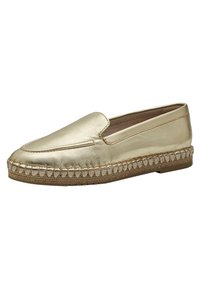 Gul läderslip-on sko med en slät yta, rund tå och vävd jute-kant längs sulan. Har en låg profil och en minimalistisk design.