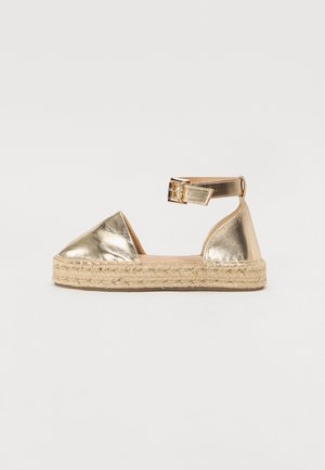 Ankle strap ballet pumps - gold coloured