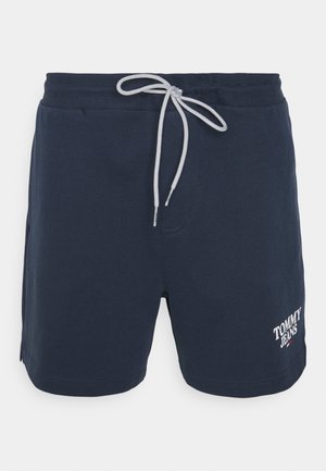 Granatowe casualowe szorty z szarą talią ze ściągaczem i białym logo Tommy Jeans na lewej dolnej części przedniej nogawki.