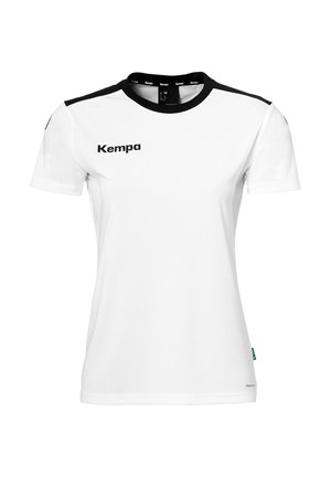 Camicetta bianca a maniche corte realizzata in tessuto liscio. Accenti neri sulle spalle. Presenta il logo "Kempa" in nero nella zona del petto sinistro.