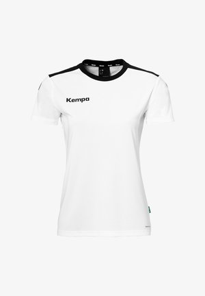 Camicetta bianca a maniche corte realizzata in tessuto liscio. Accenti neri sulle spalle. Presenta il logo "Kempa" in nero nella zona del petto sinistro.
