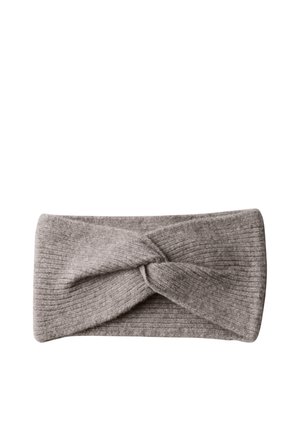 Light brown ribbed knit headband with a twisted knot detail centered on a white background.