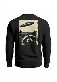 Black sweatshirt featuring a graphic print of a raccoon and a UFO in a cream color. The design has a textured border around the image.