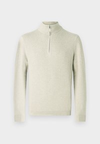 Pullover a maglia testurizzata di un beige chiaro con colletto alto e zip a un quarto, caratterizzato da polsini e orlo a coste.