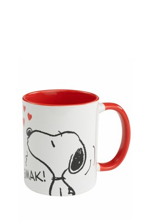 White ceramic mug with a red interior and handle. Features a black cartoon dog with hearts and the text “SMAK!” on one side.