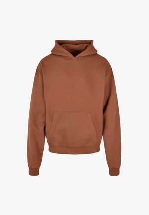 Pruun, kapuutsiga sviiter pehmest kangast, millel on esipocket ja soonikkoes varrukatel ja ääres. Lihtne ja vabamüük.