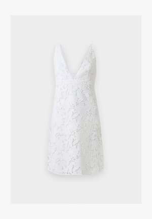 White sleeveless knee-length dress with deep V-neck and floral lace overlay on a light background.